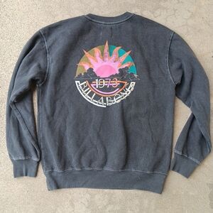 Billabong grey faded oversized sweatshirt with logo on the back.